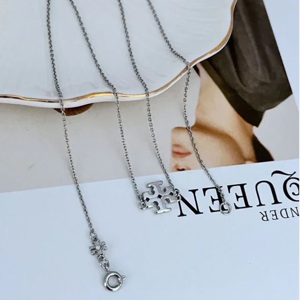 TORY BURCH • Silver Kira Logo Charm Pendant Necklace - Picture 3 of 6